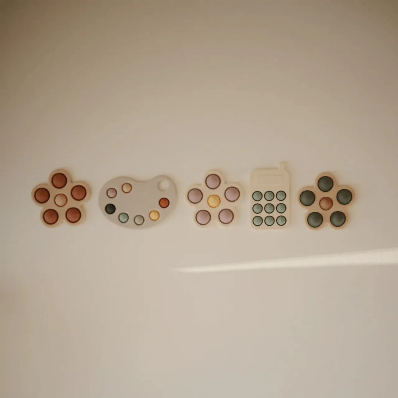 Mushie Paint Palette Press Toy - Multi