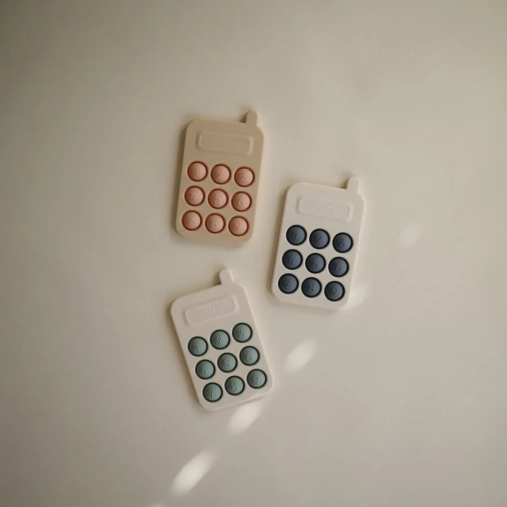 Mushie Phone Press Toy - Tradewinds